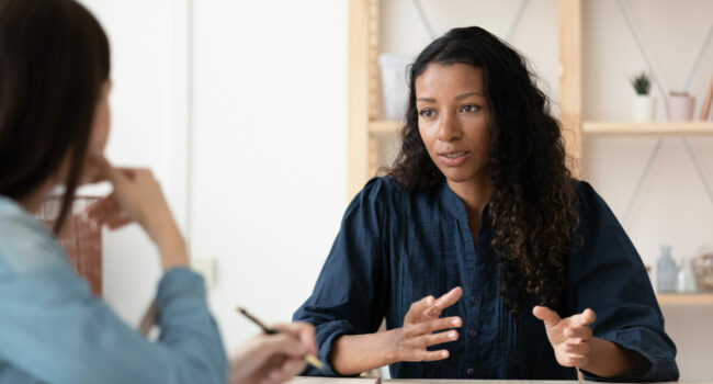 Confident,African,American,Woman,Candidate,Speaking,At,Job,Interview,,Answering